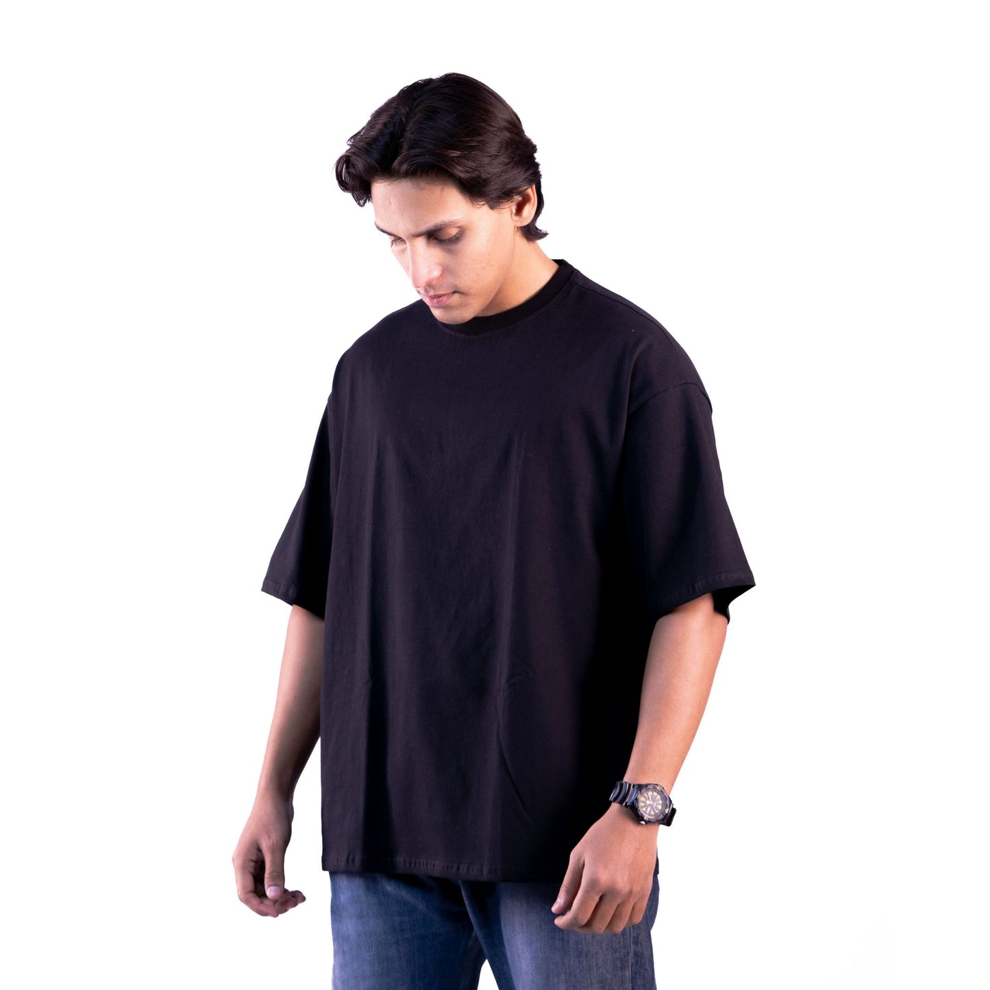 Unisex black midnight oversized t-shirt flatlay – premium fabric, oversized comfort for all occasions.