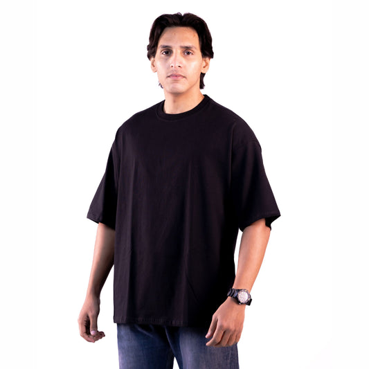 Black midnight oversized t-shirt front view – unisex streetwear style with a relaxed fit.