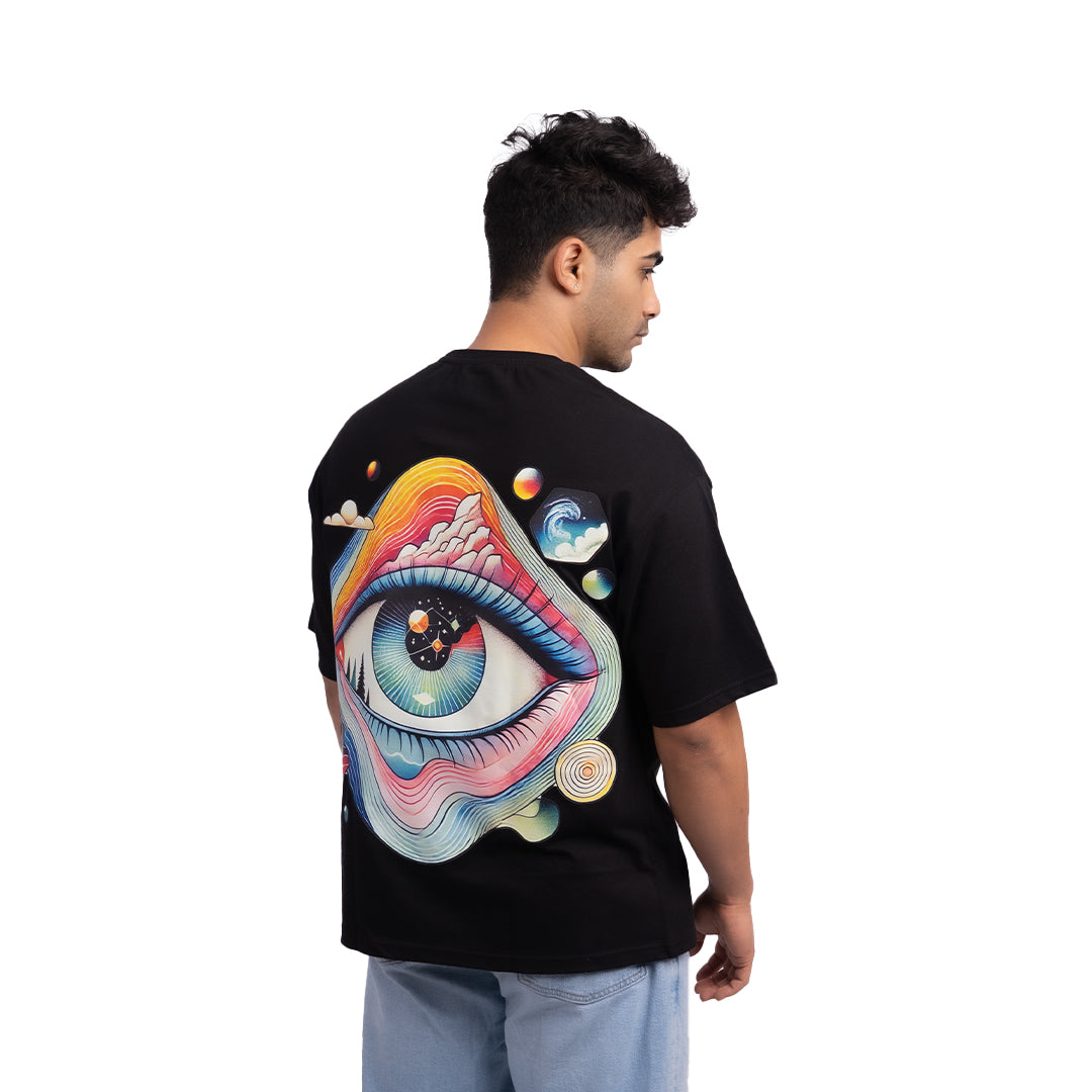 Eye of Reality oversized t-shirt angled view – modern oversized tee with a visionary design, perfect for those who see beyond the ordinary.
