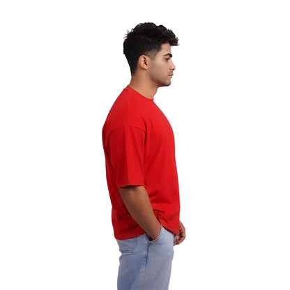 Unisex oversized red t-shirt side view – premium cotton oversized tee with a breathable fit and modern silhouette.