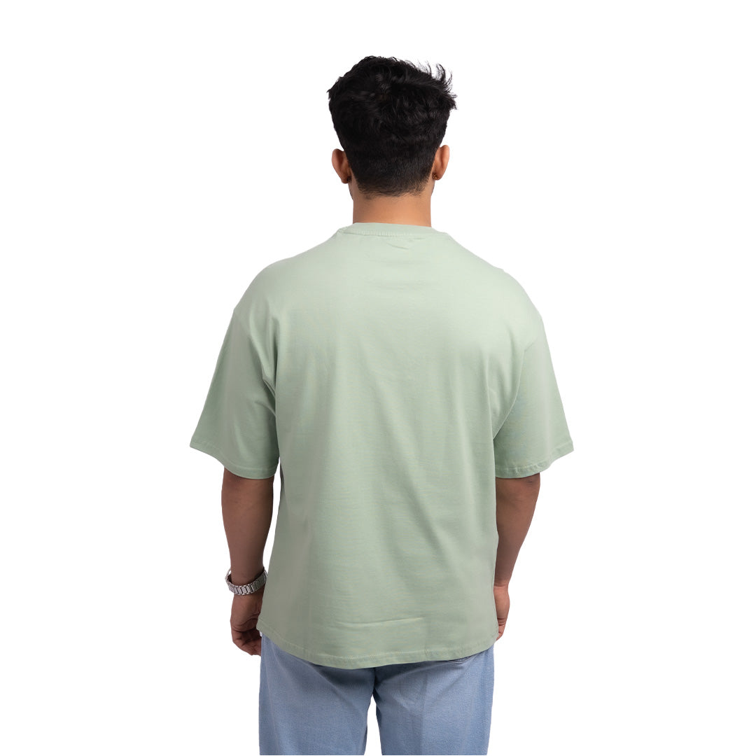 Oversized teal t-shirt back view – modern oversized tee in a deep teal shade, perfect for casual, streetwear, and layered outfits.