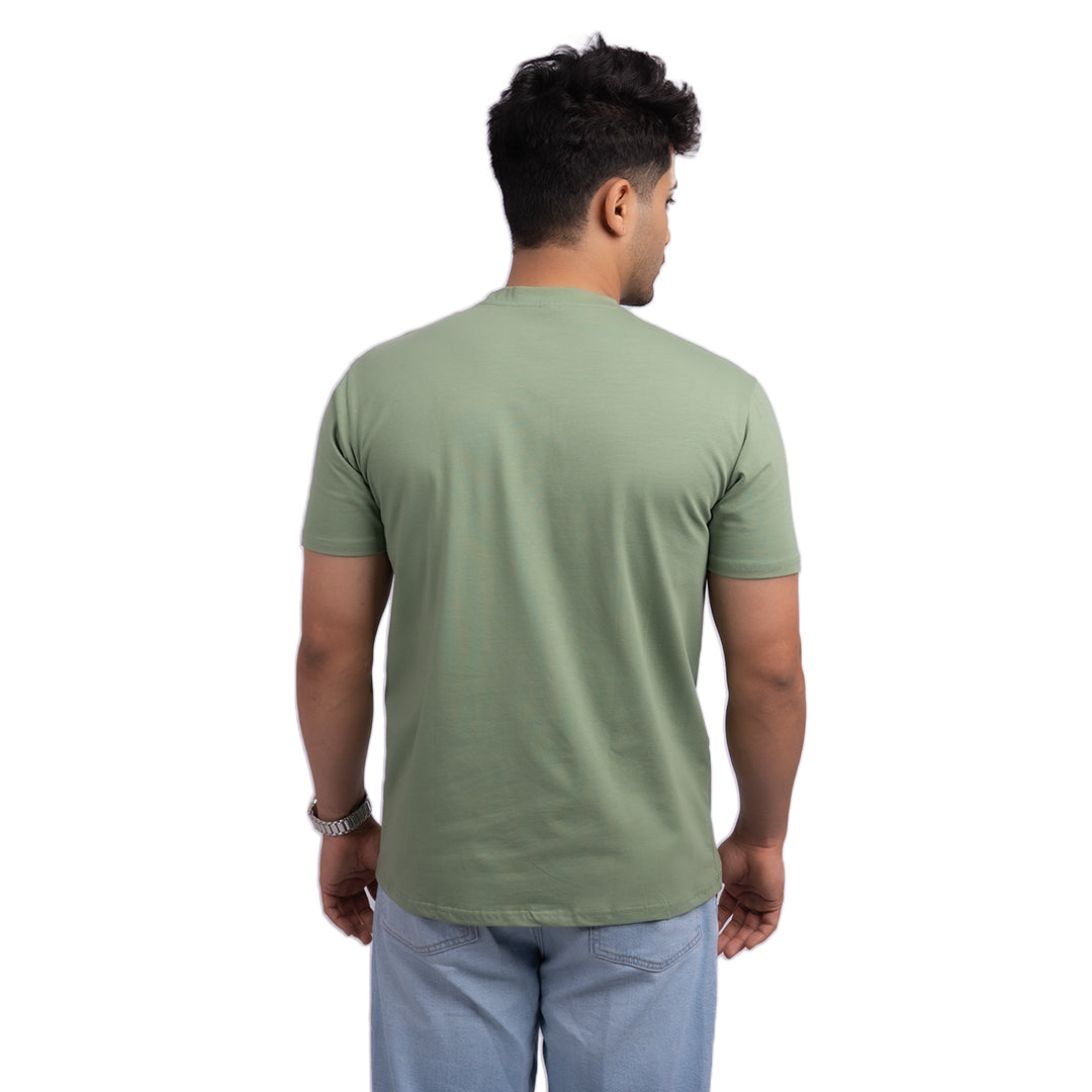 Teal cotton t-shirt detail – soft, high-quality fabric with reinforced seams for long-lasting comfort.