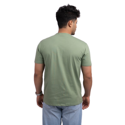 Teal cotton t-shirt detail – soft, high-quality fabric with reinforced seams for long-lasting comfort.