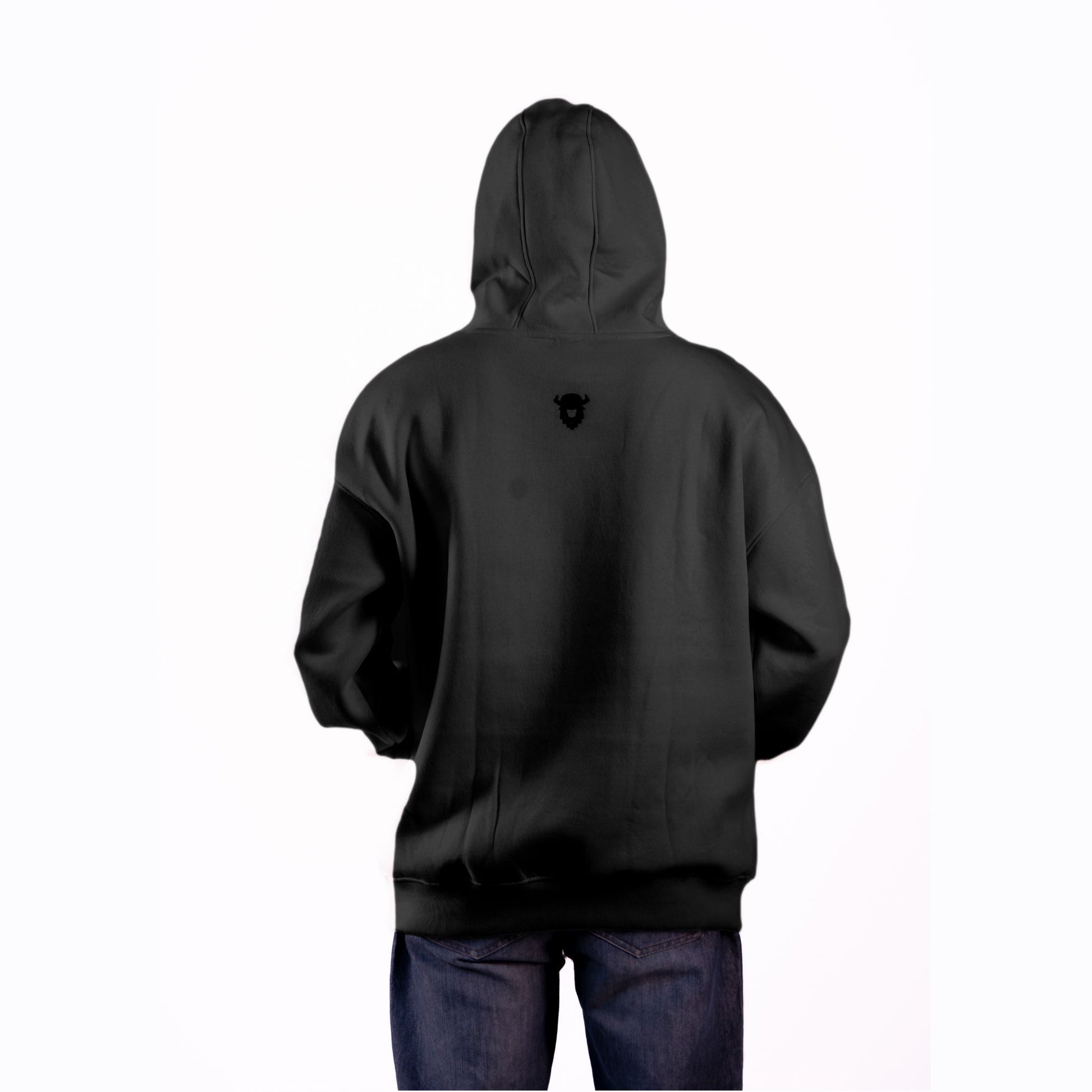 Oversized black midnight hoodie back view – clean, minimalist design for a bold statement.